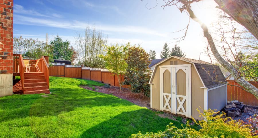 Fenced backyard with storage shed in Indianapolis